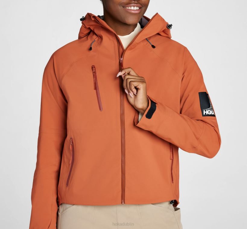 VLP8373 Hoka Women Transport Rain Jacket Baked Clay